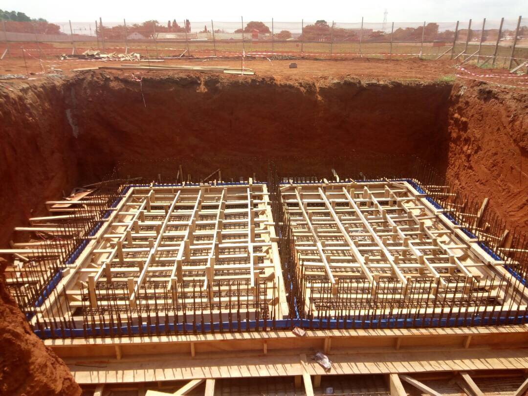Ground tank base construction